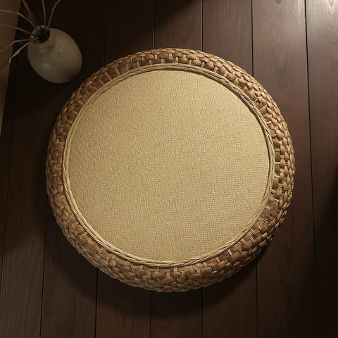 Round woven mat on a wooden floor