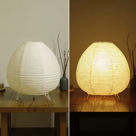 Two views of a round, ribbed table lamp on a wooden surface.